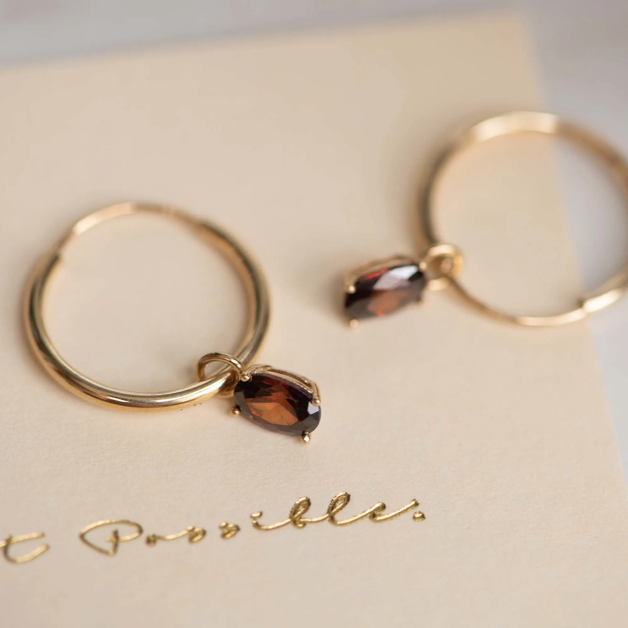 Baguette Brune 14 karat gold hoop earrings with brown zirconia stone