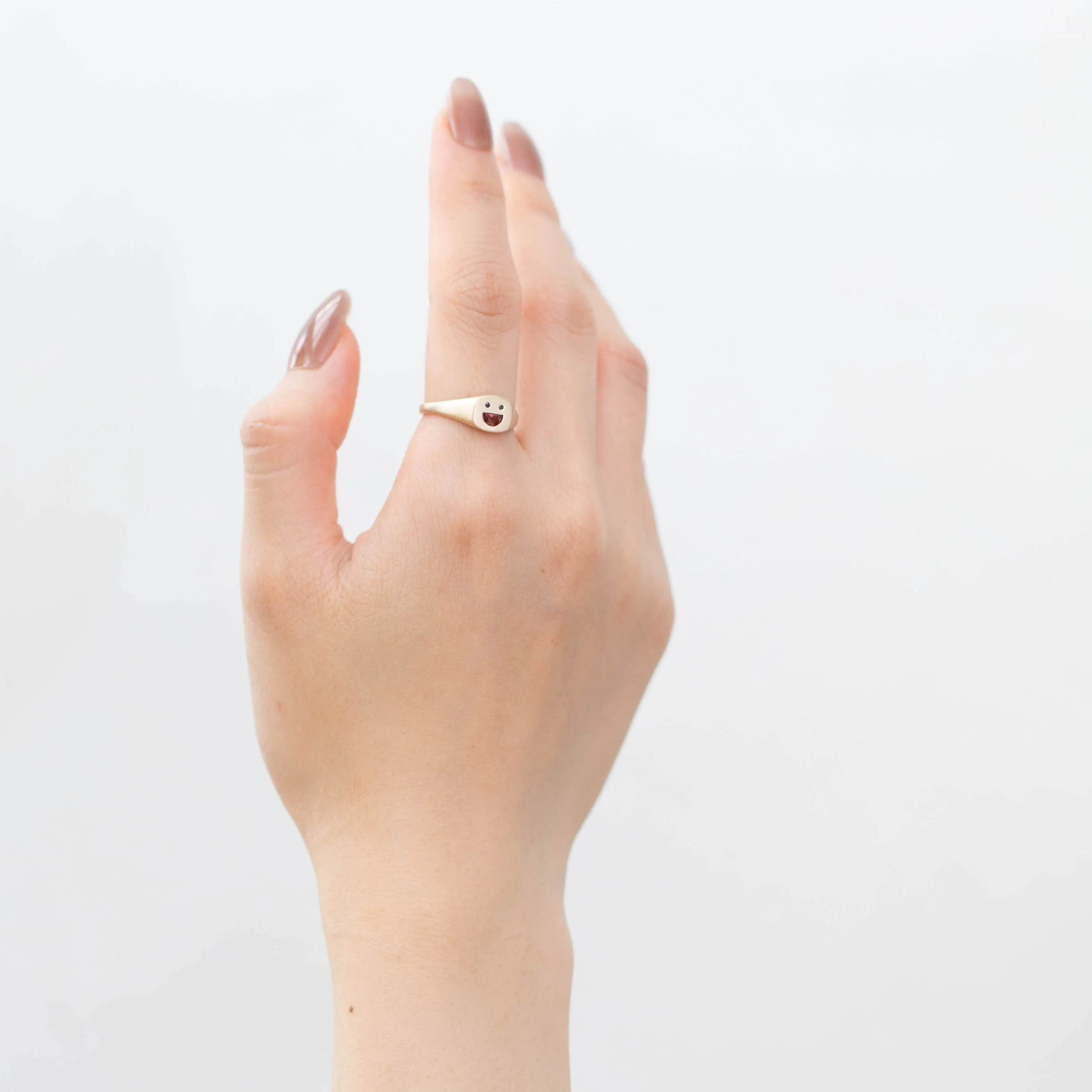 Small happy face signet ring